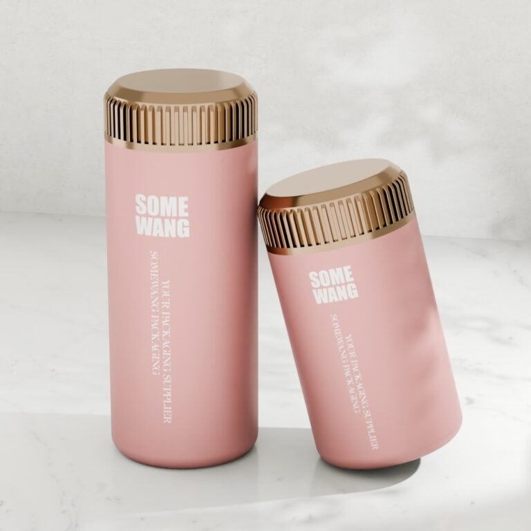 Pink cosmetic bottles with gold caps for body powder or skincare products.