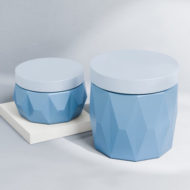 Blue PP cylinder cosmetic jars with white screw caps for skin care products.