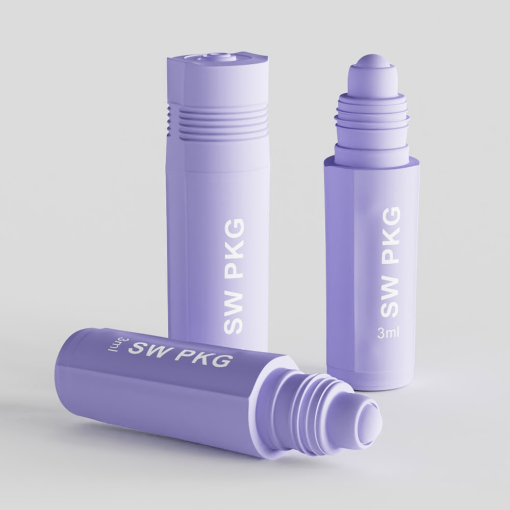 Purple mini lip gloss containers with roll-on applicators for cosmetics.