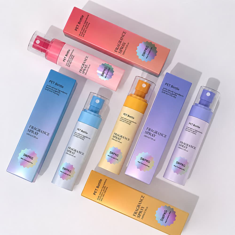 Assorted glossy plastic mist spray bottles for cosmetics and fragrances.