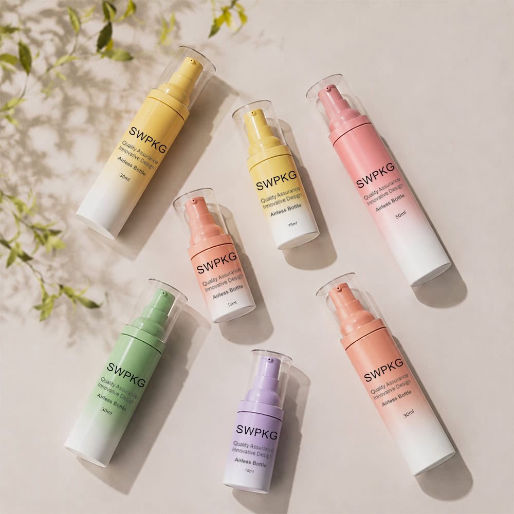 Colorful frosted plastic airless pump bottles for skincare products.