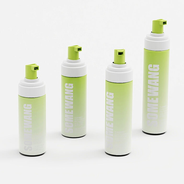 Set of four green and white plastic foaming pump bottles for personal care.