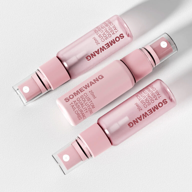 Pink 20ml facial mist spray bottles with pump for skincare.