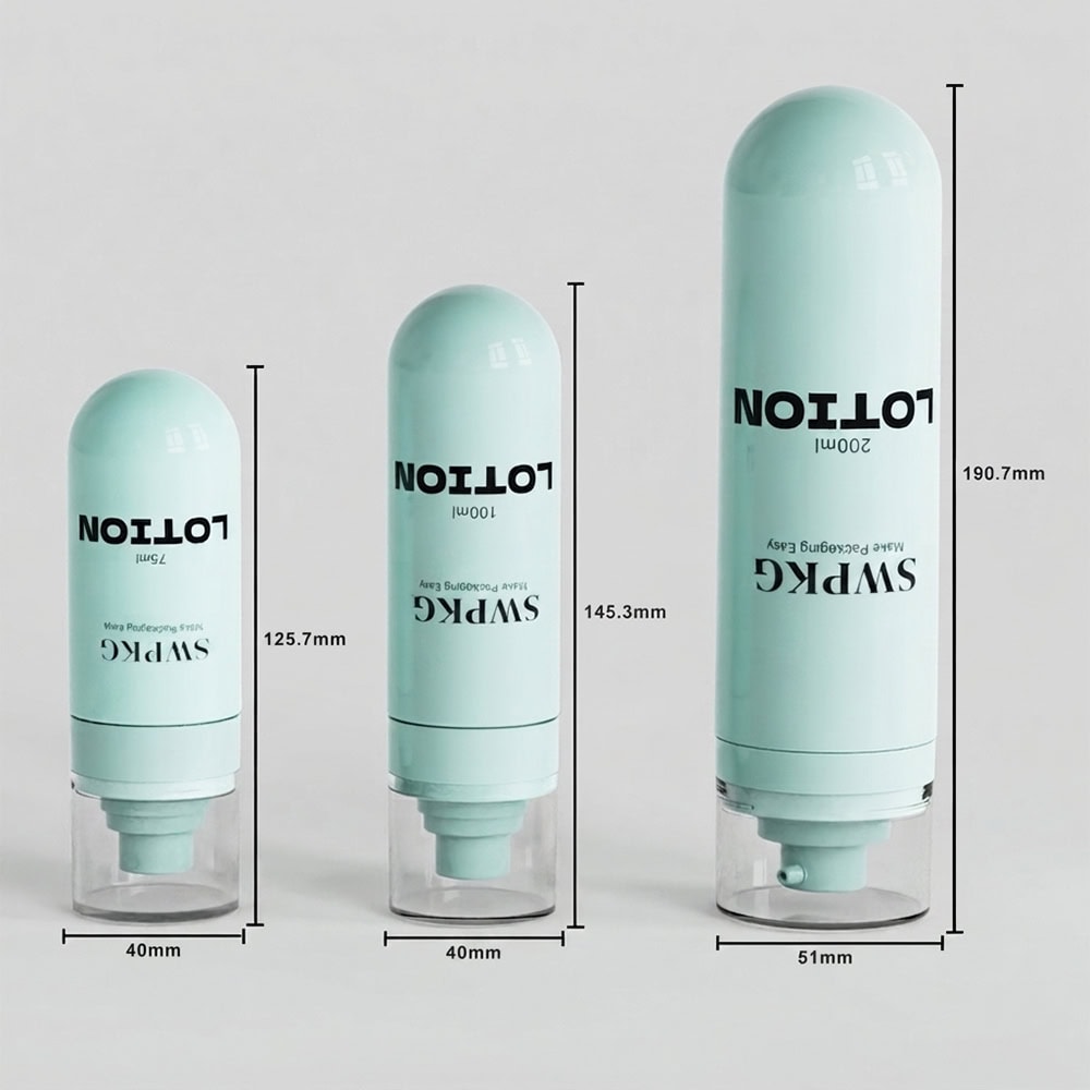Set of three luxury skin care lotion bottles in different sizes with clear caps.