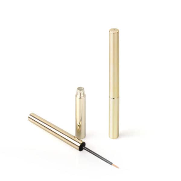 golden eyeliner tube with brush tip luxury cosmetic packaging for eye make up