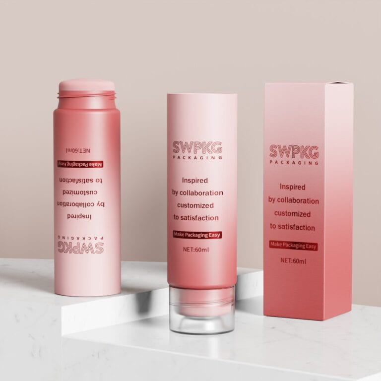 Pink cosmetic bottle with cap and box for makeup packaging.