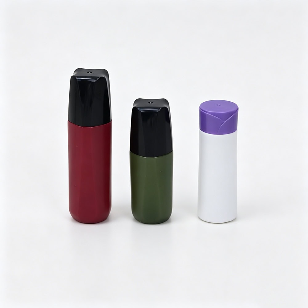 Three plastic travel bottles with black caps in red, green, and white with purple lid.