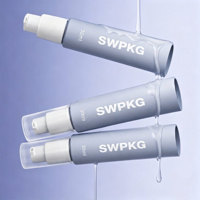 Three 30ml airless skincare tubes with white pumps and gray bodies on a light purple background.