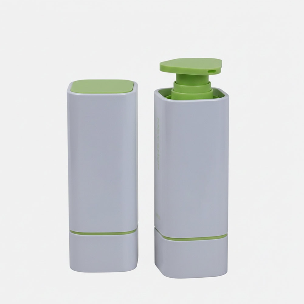 Refillable airless bottle with green pump for cosmetics or skincare products.