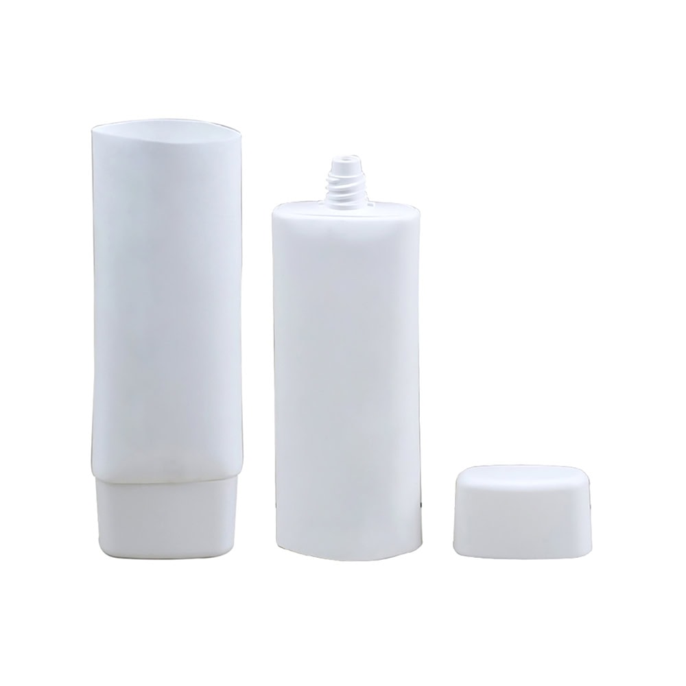 White PE flat tube with screw cap for packaging products.