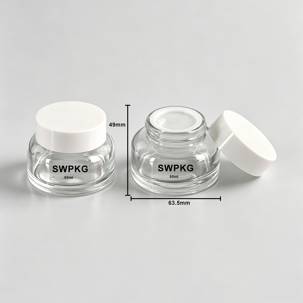 Clear 50ml glass jar with white lid, perfect for packaging cosmetics or creams.