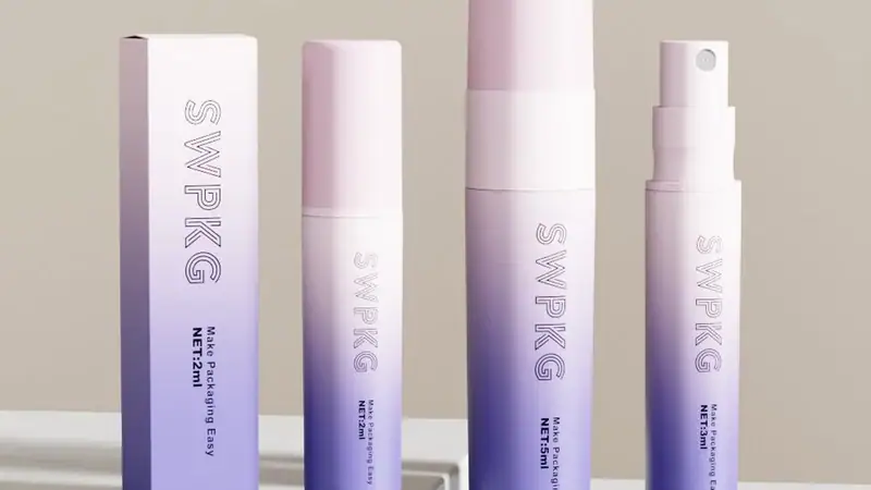 Elegant cosmetic bottles with pink and white design for beauty packaging.